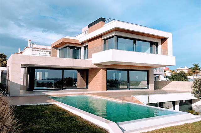 large house with an infinity pool